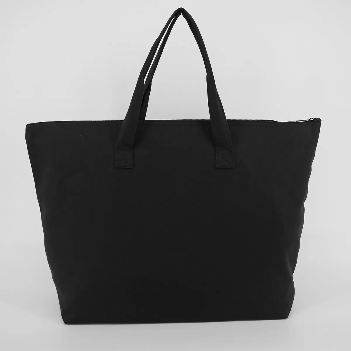 Large cotton canvas tote with a zippered closure and handles