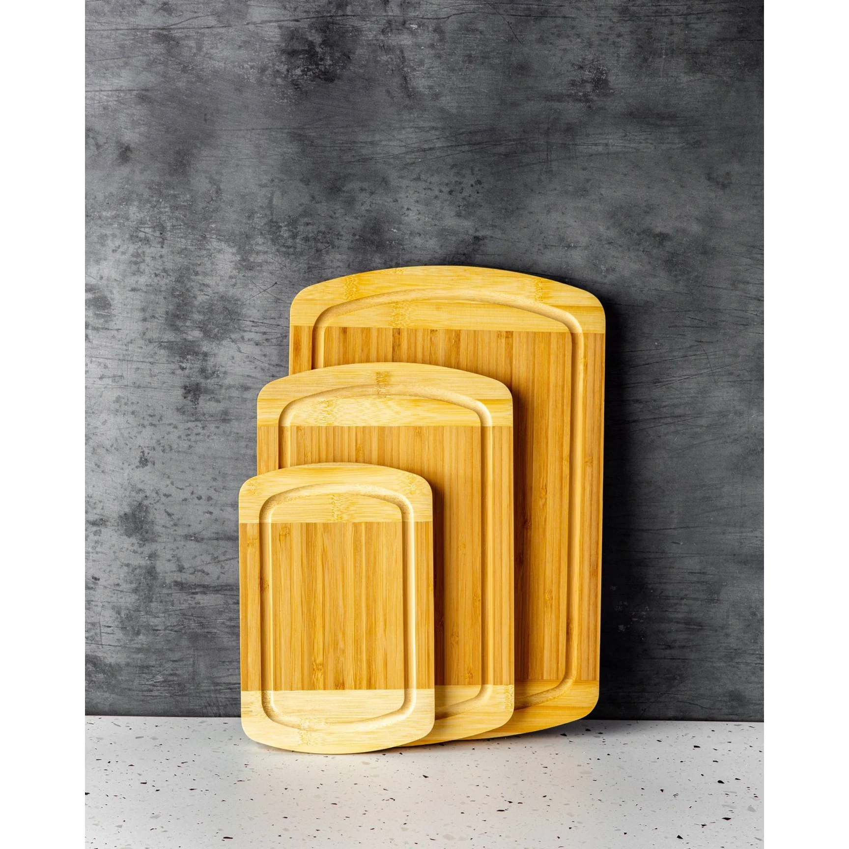 Compact bamboo cutting board with two-tone design