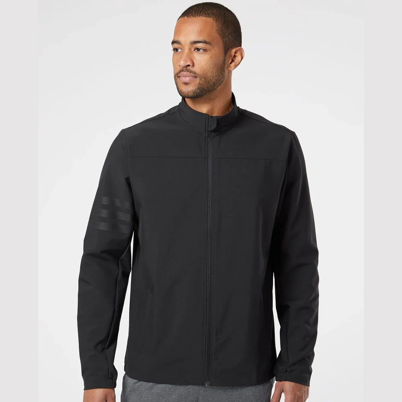 Men's wind-resistant full-zip jacket displayed on a mannequin