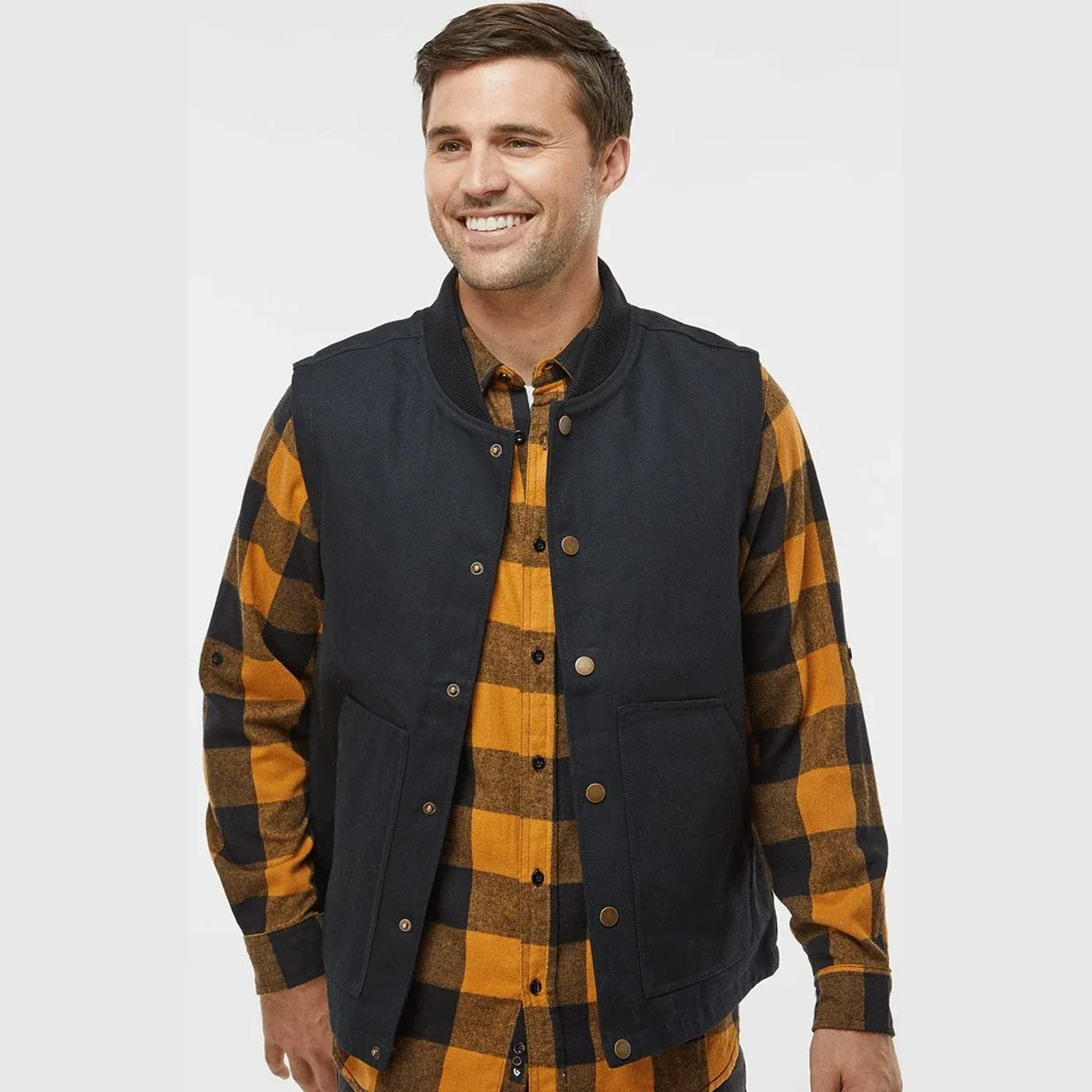 Men's insulated canvas vest with heavy-duty brass snaps